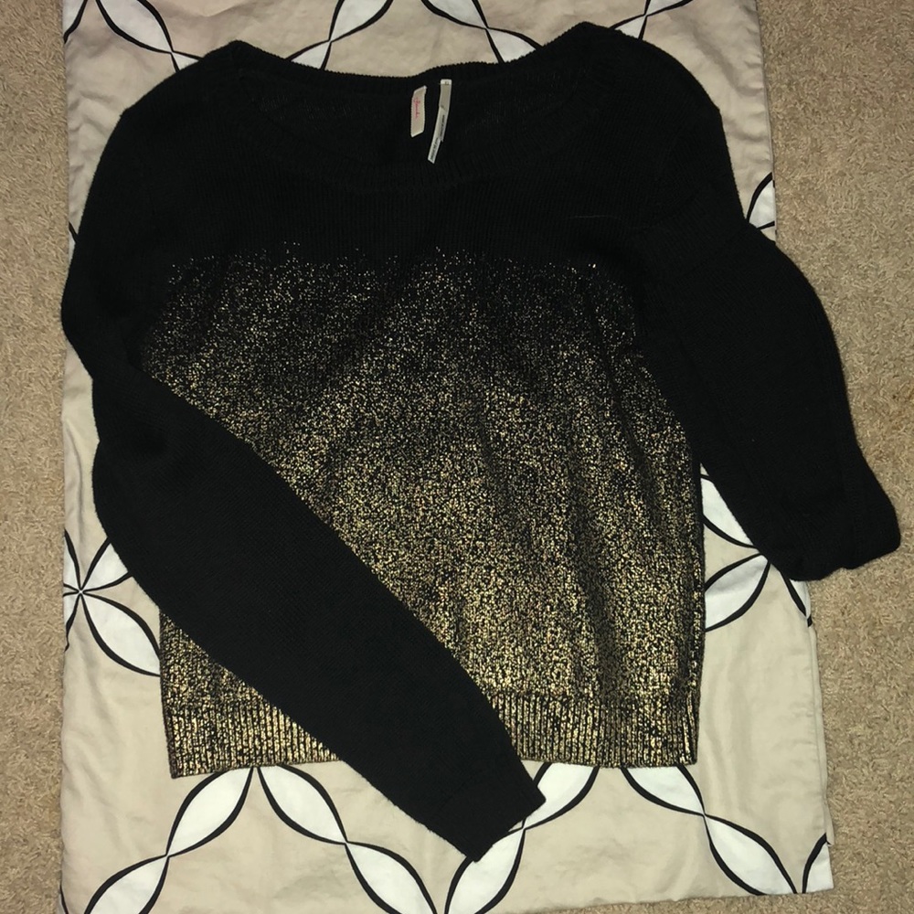 Black and gold sweater